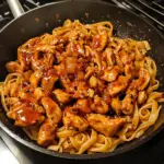 cooking pasta in a skillet